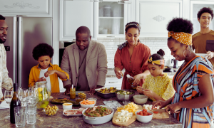 A family preparing dinner together